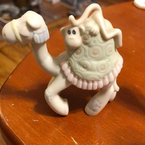 Precious Moments monkey on camel